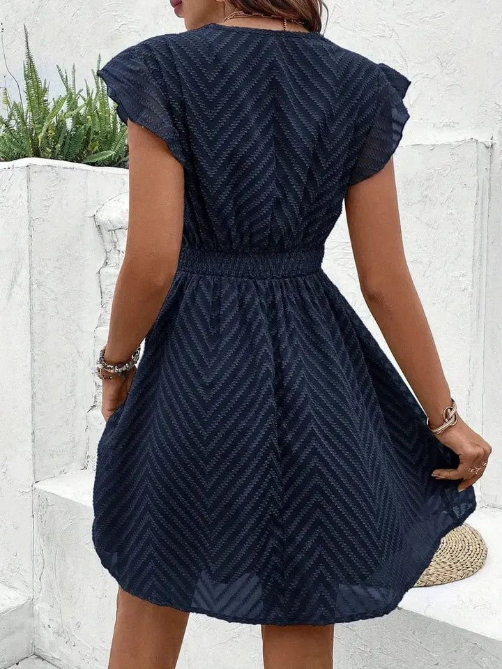 Model wearing a white elegant sweetheart dress, full-length shot