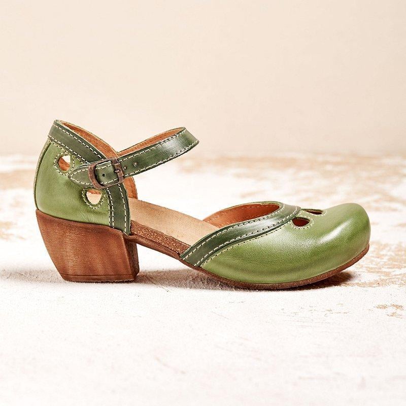 Close-up of Charlotte sandal's contoured arch-support footbed and soft cushioning
