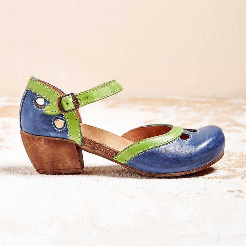Charlotte low heel sandals in blue styled with a floral midi dress on a model