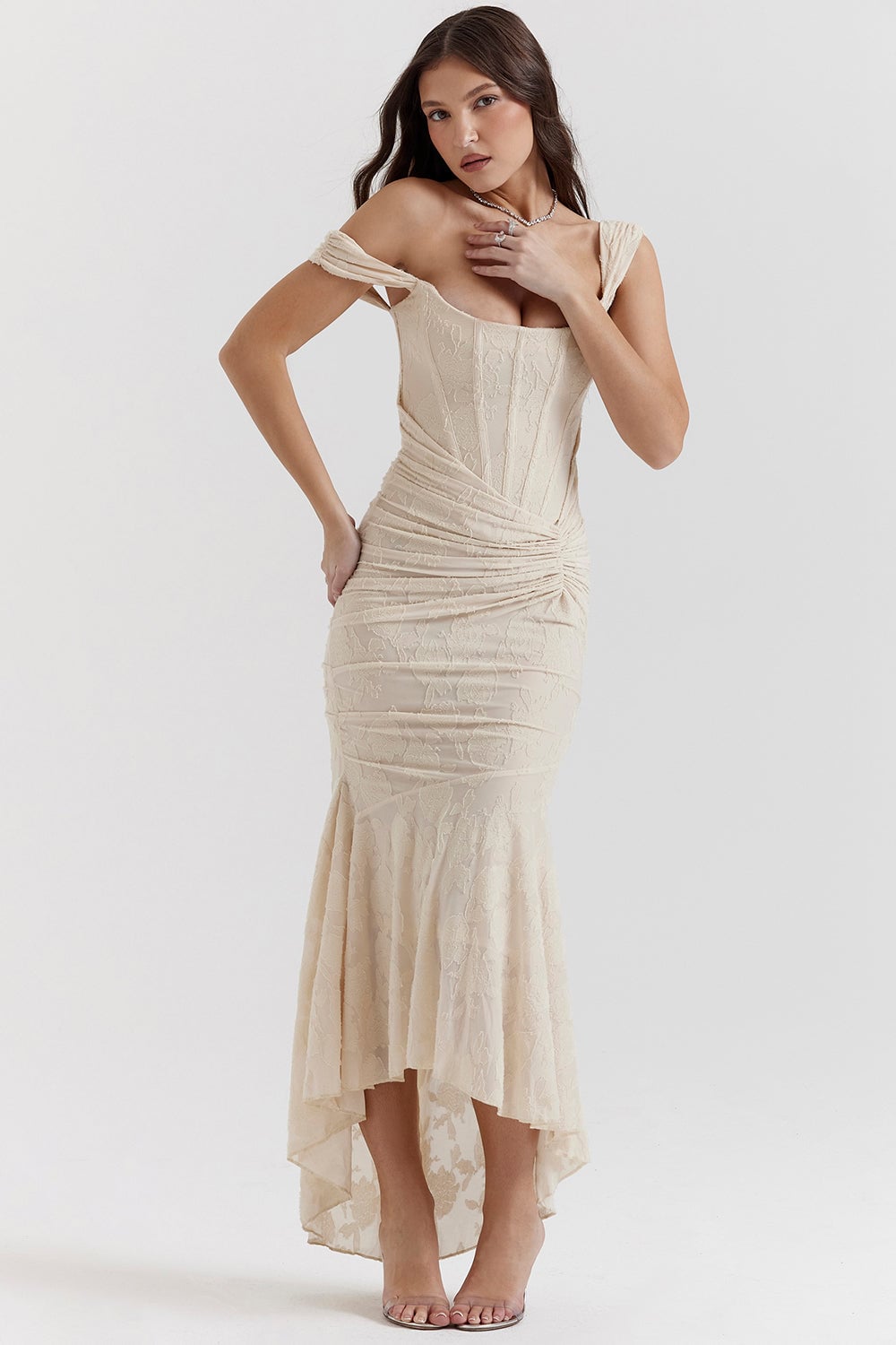 Charlotte pink bodycon dress styled with heeled sandals and gold jewelry