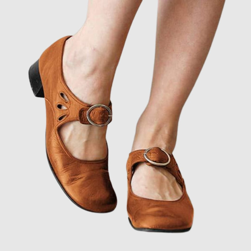 Brown Chelsea boot for women with clean lines and lightweight construction, three-quarter view