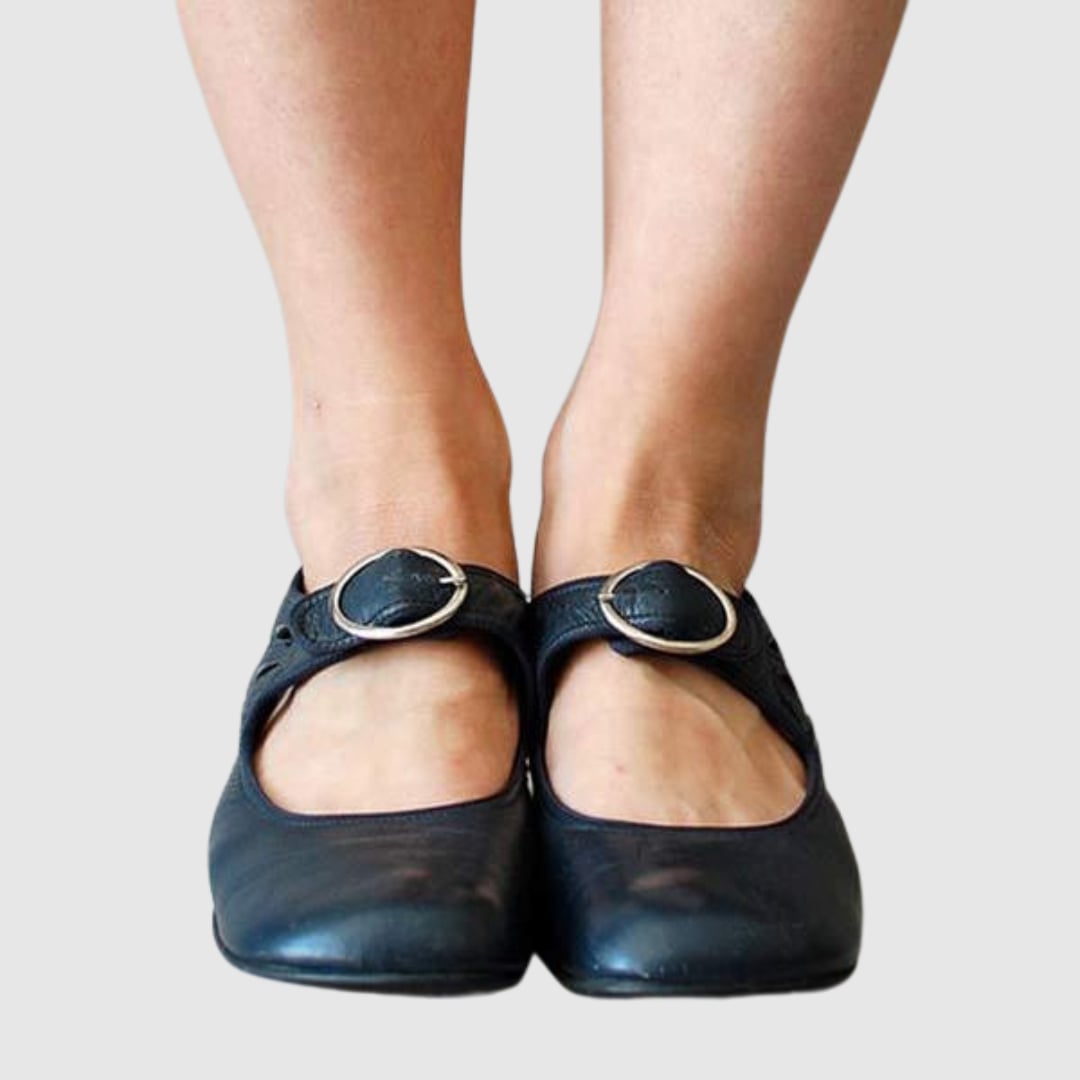Close-up of elastic side panel on women's classic Chelsea boot in black
