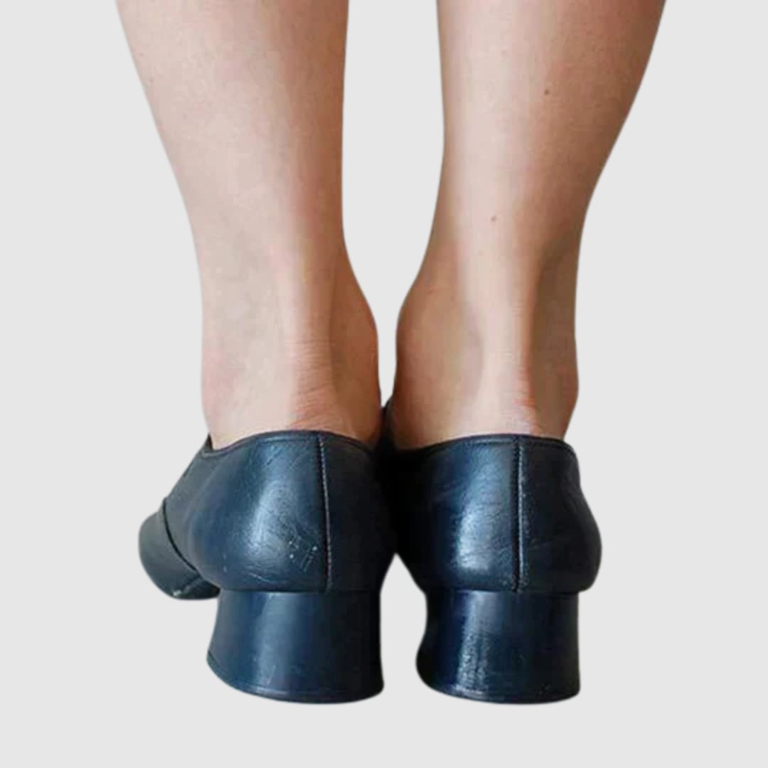 Women's Chelsea boots in all four color options: black, red, brown, and blue