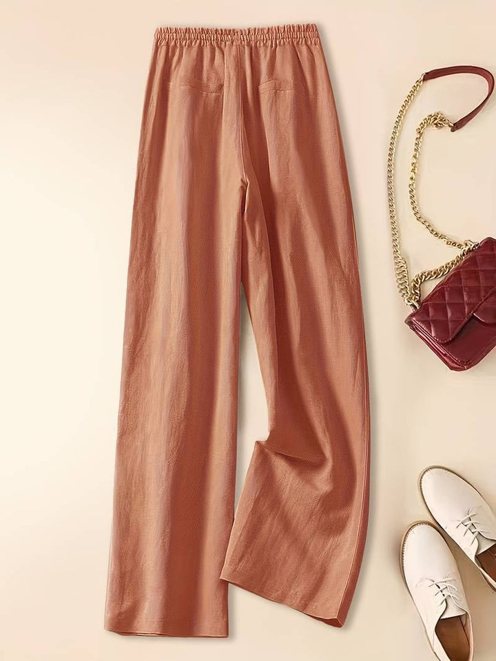 Detail shot of elastic drawstring waistband on relaxed fit pants