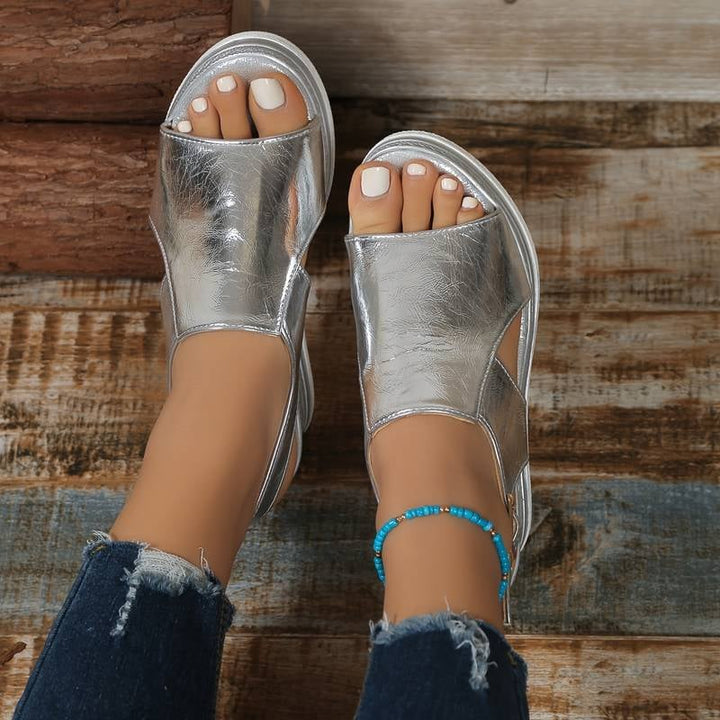 Cheryl sandals in gold and silver displayed side by side to show color options