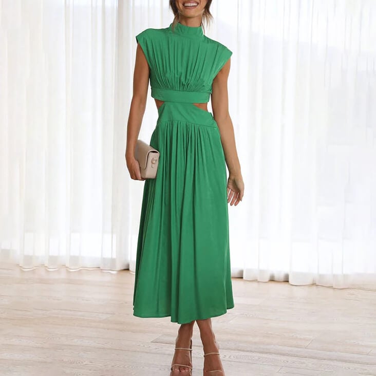 Animated gif showing a woman wearing a flowing halter dress in a warm outdoor setting