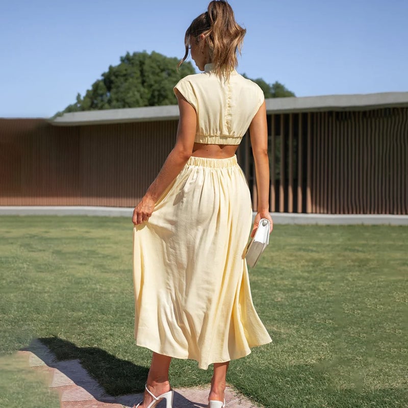 Woman wearing the halter dress in blue, full-length front view