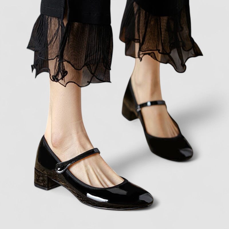 Classic elegant mary jane style shoe in black with a cushioned insole and streamlined silhouette, shown on a white background