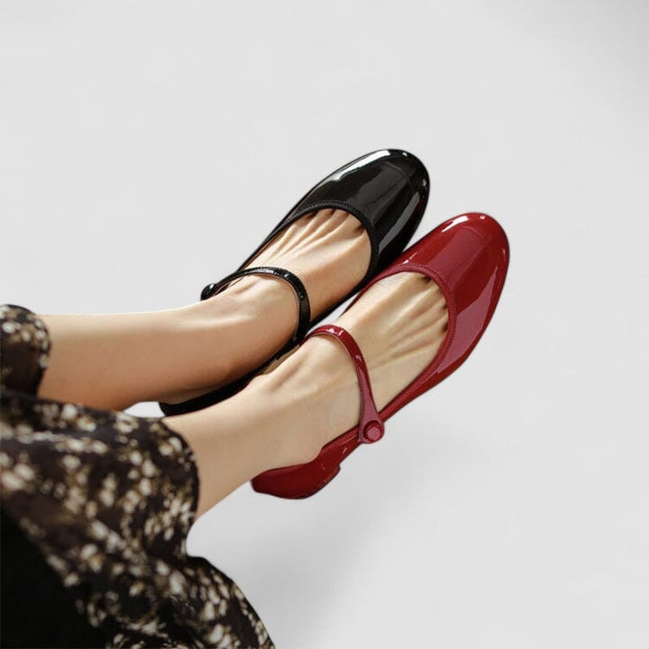 Top-down view of black classic elegant shoes showing the toe shape and subtle decorative detailing
