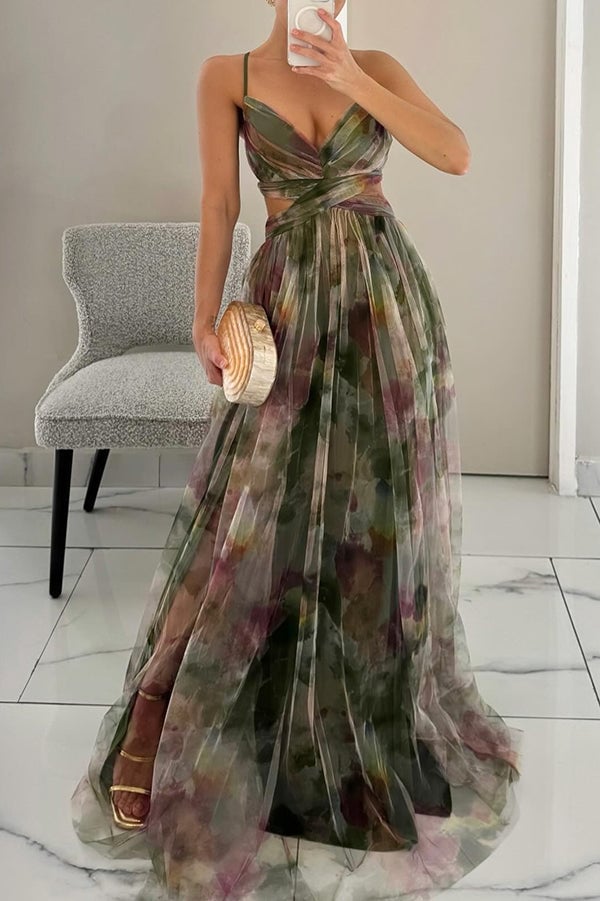 Back view of the green floral print maxi dress showing the flowing skirt and clean finish