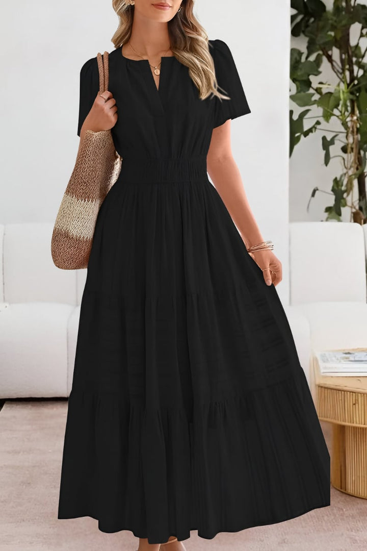 Front view of the Boho Breeze summer dress in black showing flattering flow fit