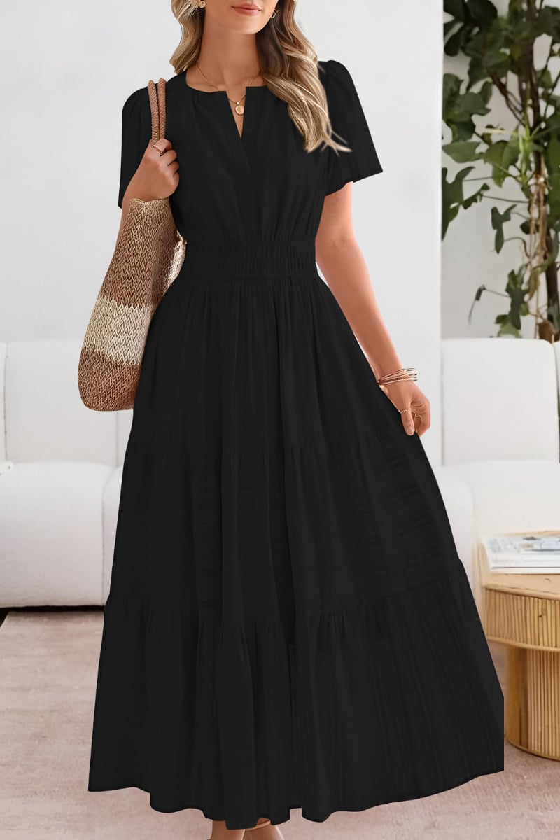 Front view of the Boho Breeze summer dress in black showing flattering flow fit