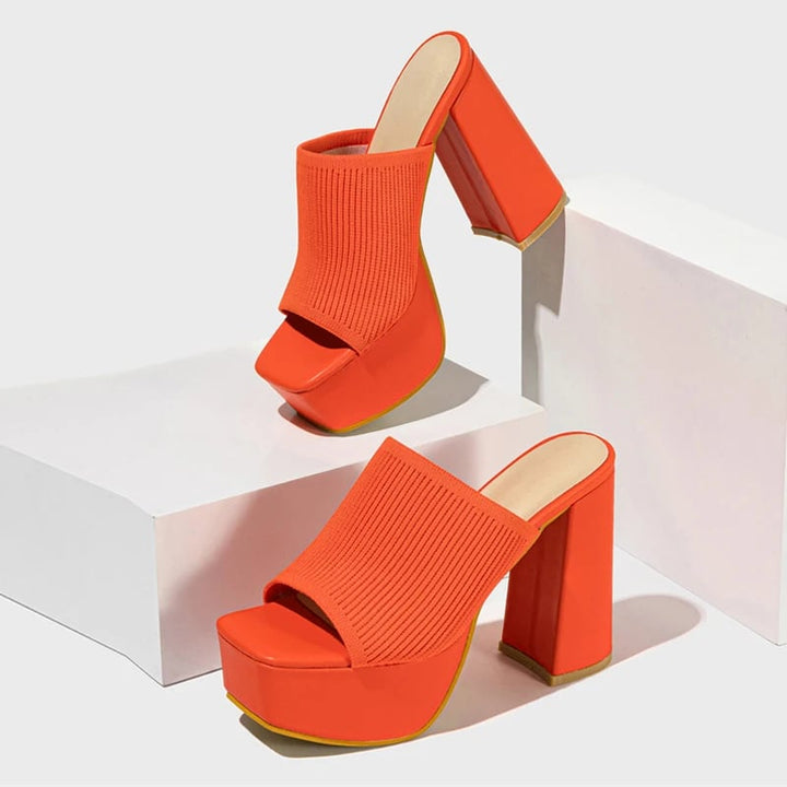Cinnamon women's platform sandals in orange with cushioned insole and slip-resistant sole, front view