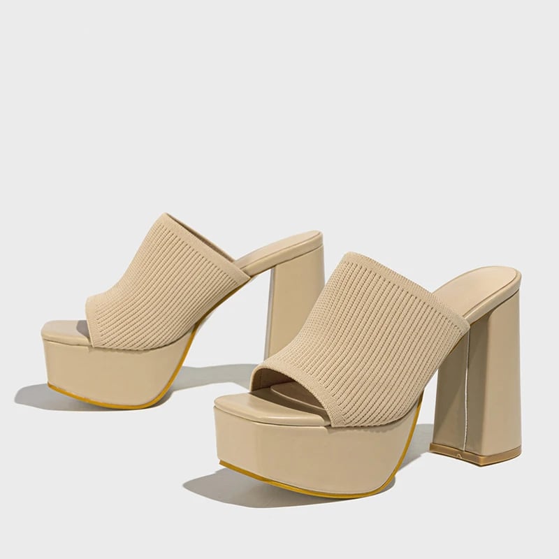 Cinnamon platform sandals in beige shown at a side angle highlighting the lightweight platform sole