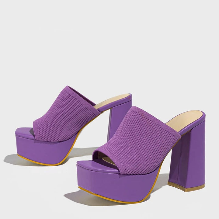 Cinnamon platform sandals in beige on a model walking outdoors showing comfort and style