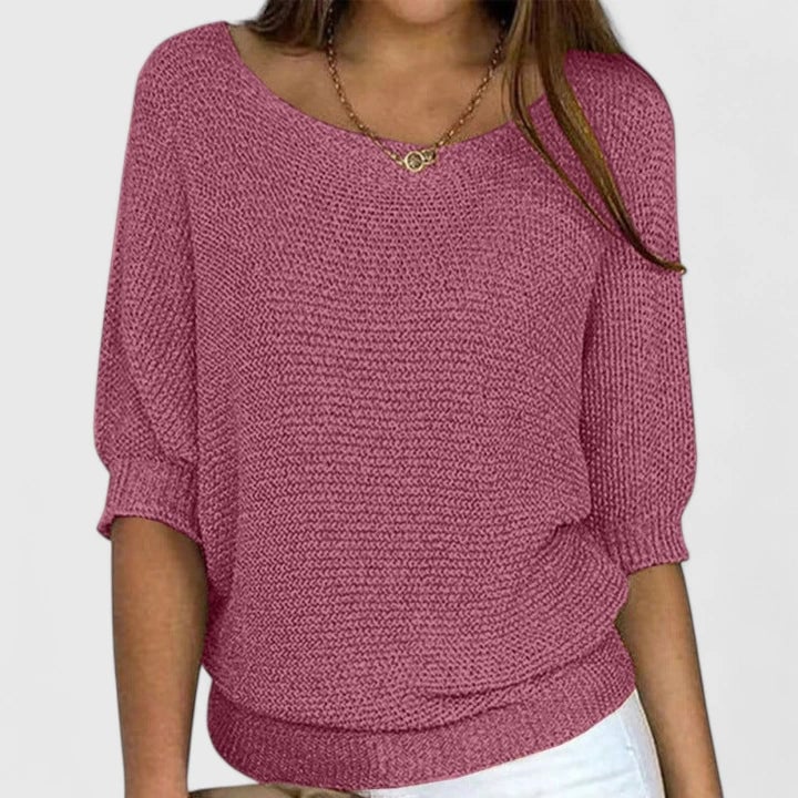 Claire comfortable sweater in pink displayed on a model with a polished casual look