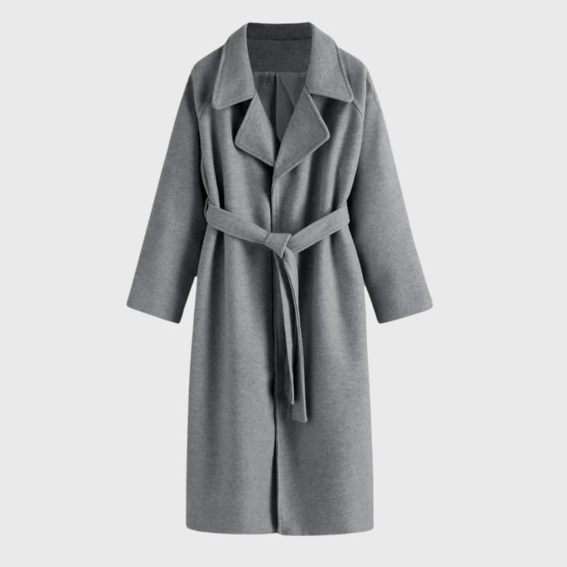Close-up of the overcoat's pocket and belt detail in deep grey premium fabric