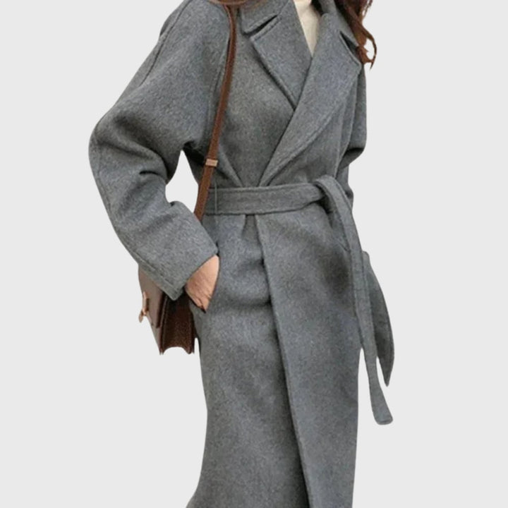 Flat lay of the belted overcoat in brown showing full length and sleeve details