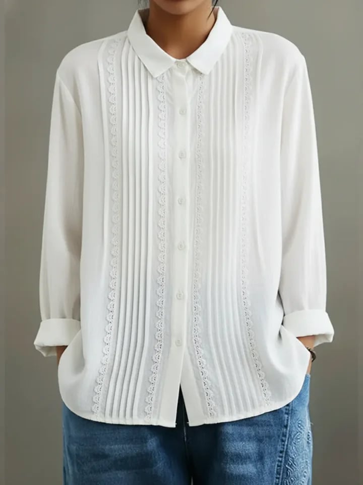 Front view of the Claire lace trim button-up long sleeve blouse in white with pleated front panel and point collar