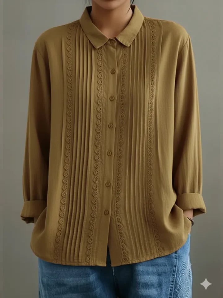 Claire lace trim blouse in blue styled loosely over jeans for a casual weekend outfit