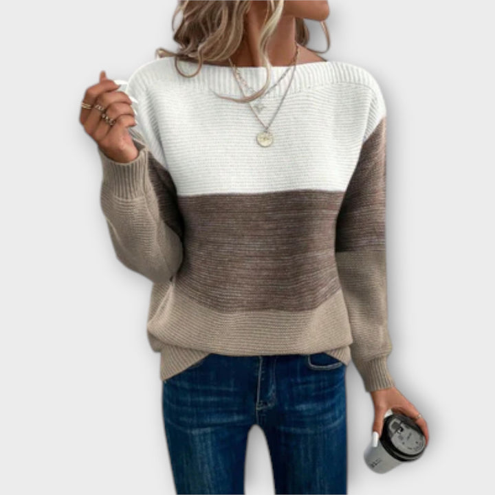Close-up detail of the Clara sweater showing its soft, breathable fabric texture and relaxed silhouette