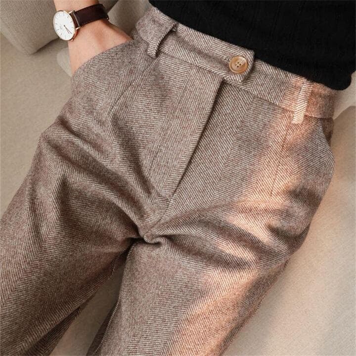 Model wearing Clarisse tailored pants in a neutral tone, styled for a polished everyday look
