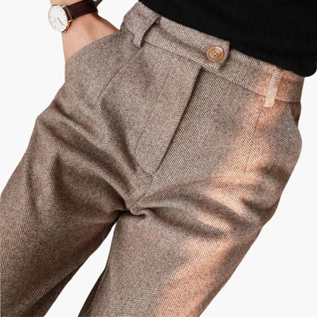 Side profile view of Clarisse tailored pants highlighting the flattering silhouette and lightweight fabric