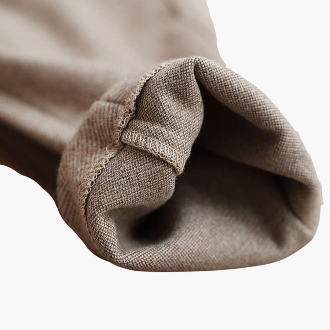 Flat lay of Clarisse tailored pants in all three available colors — beige, brown, and grey
