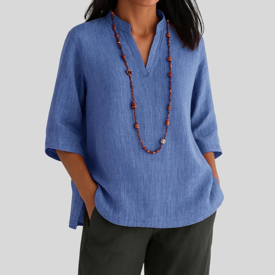 Close-up detail of the Claudia blouse showing its soft fabric and flattering relaxed silhouette