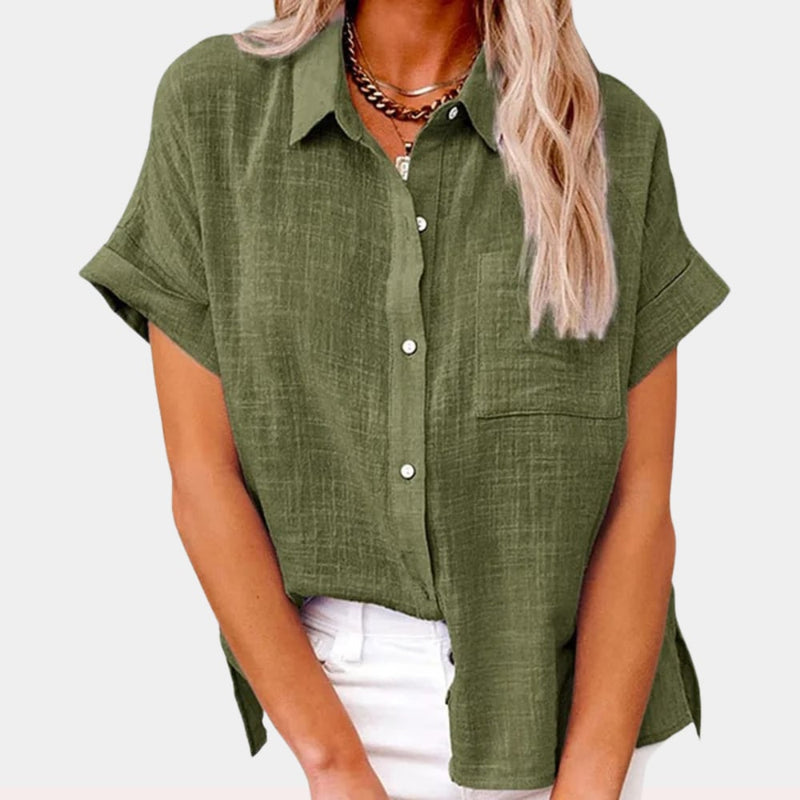 Close-up of the Claudia shirt's front pocket and button placket detail