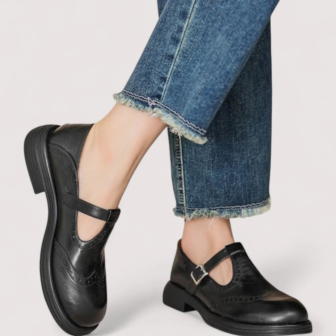 Claudia orthopedic Mary Jane shoes in black, front angle view showing rounded toe silhouette