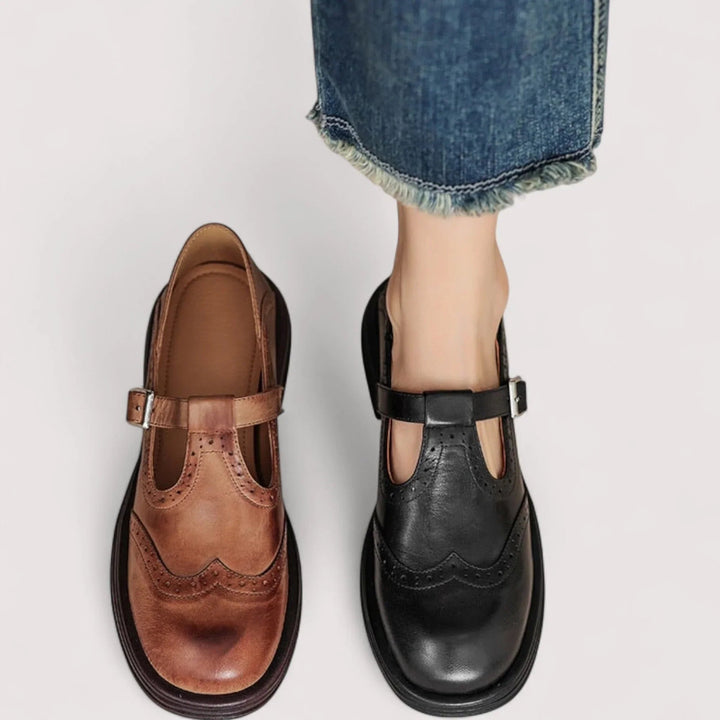 Pair of Claudia orthopedic Mary Jane shoes in both brown and black displayed side by side