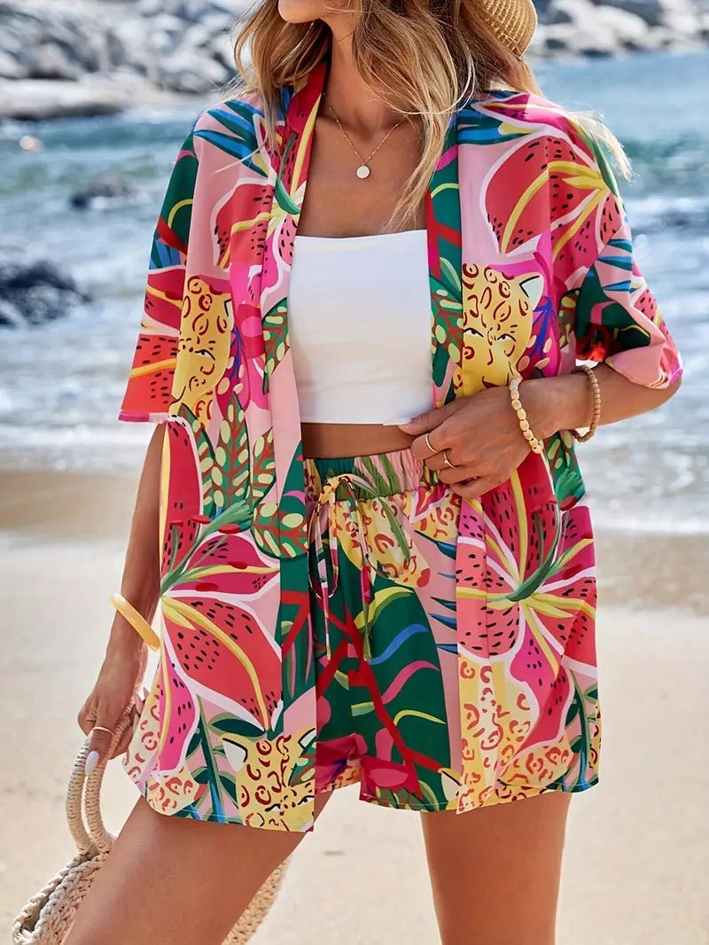 Model wearing blue floral kimono set styled with open cardigan draped over shoulders