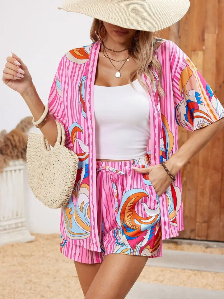 Side view of relaxed-leg floral shorts with drawstring waist detail