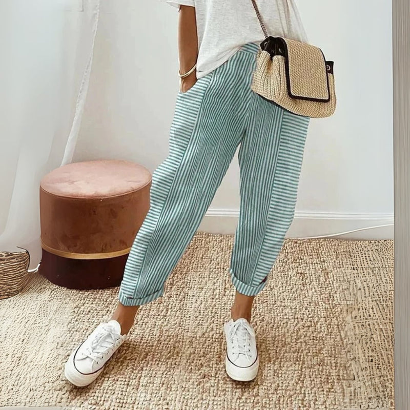 Close-up detail of the stripe pattern and fabric texture on women's wide leg pants