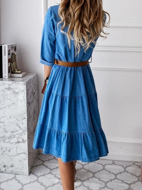 Close-up side view of the Clementine blue summer dress showing the lightweight fabric and feminine silhouette