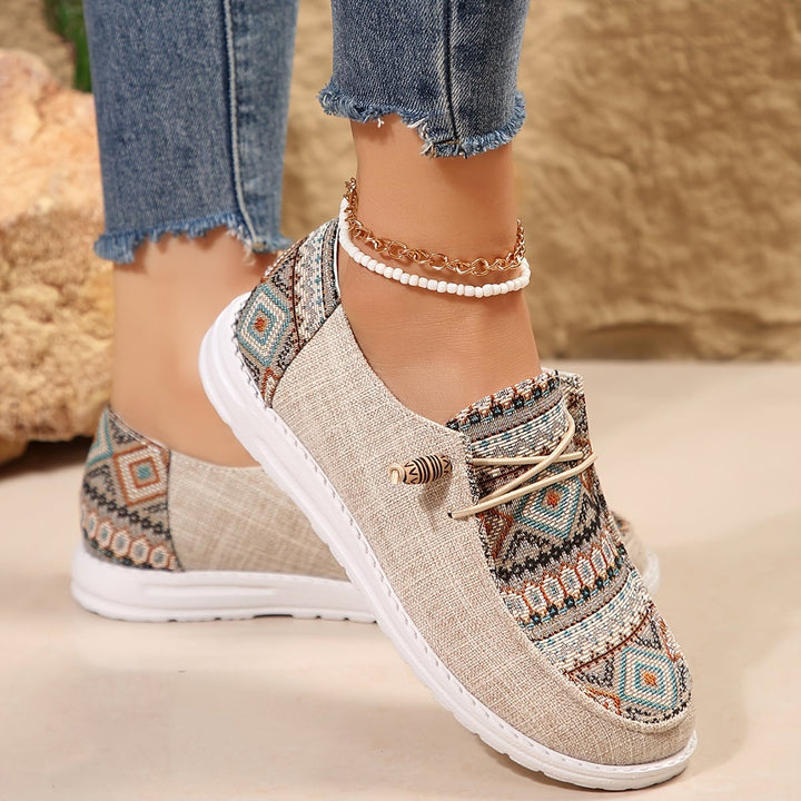 Clementine women's sneakers in khaki with tribal-inspired pattern, front view