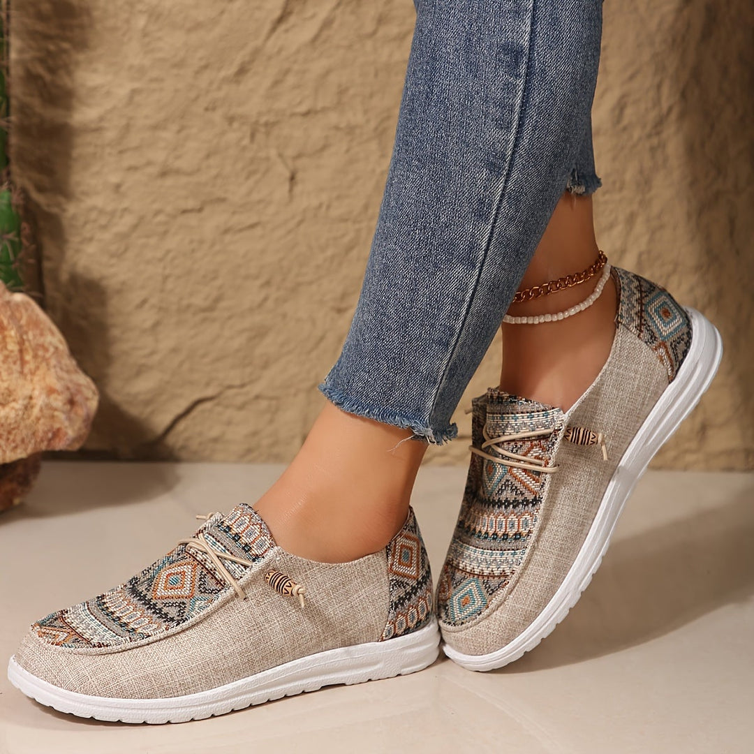 Close-up of tribal pattern detailing on Clementine women's sneakers in khaki
