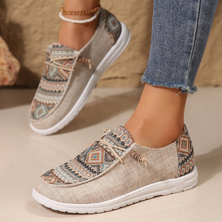 Rear view of Clementine khaki tribal-print sneakers showing heel construction