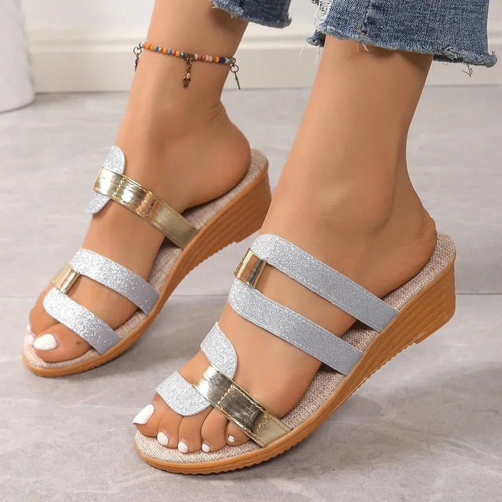 Clementine slip-on sandals in Wine Red displayed flat on a neutral background