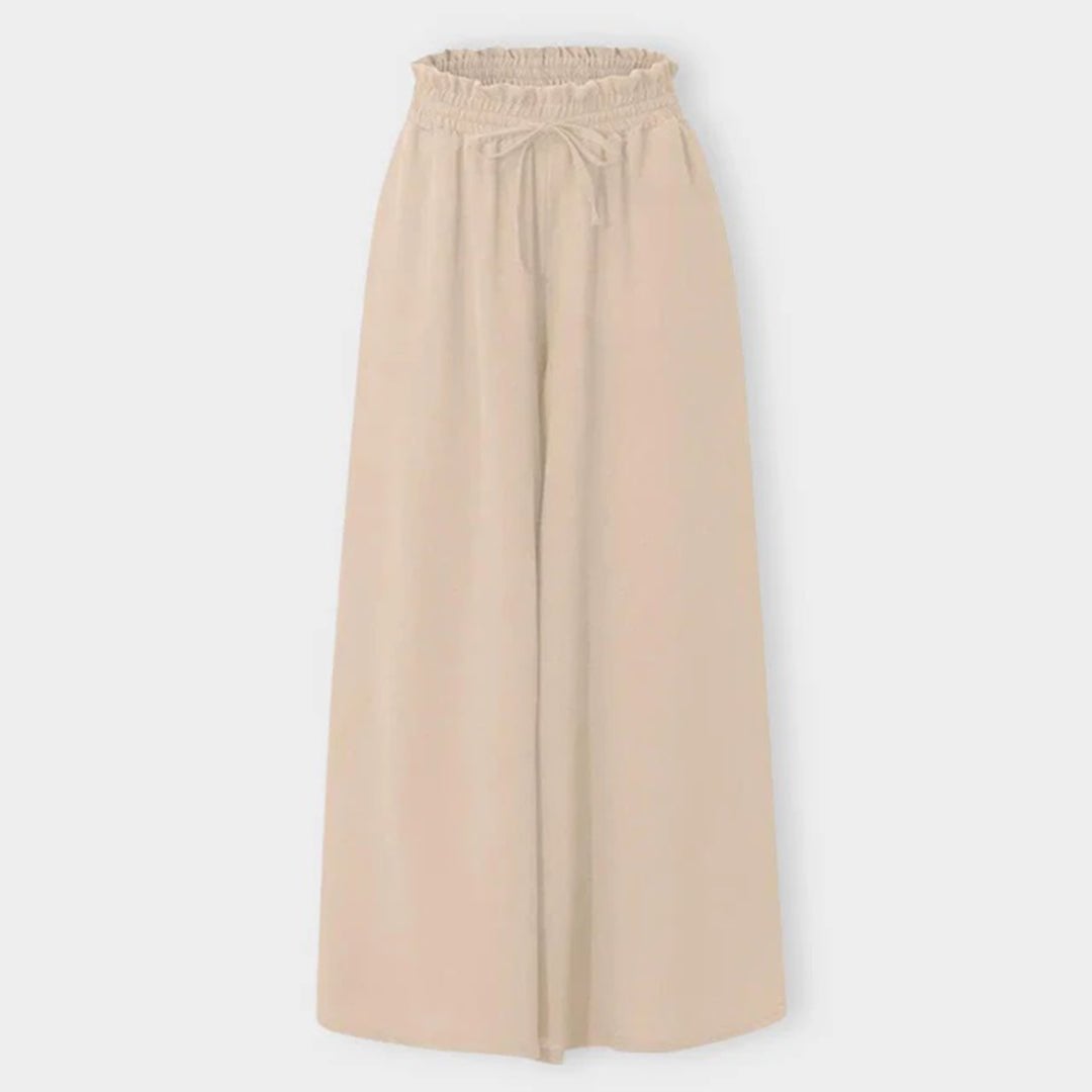 Detail shot of lightweight breathable fabric on wide leg palazzo pants
