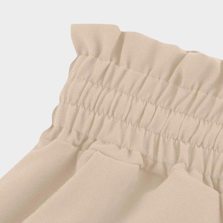 Flat lay of high waisted palazzo pants showing all available color options