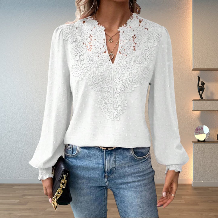 Close-up of the airy soft-touch fabric of the Colette lightweight blouse in white