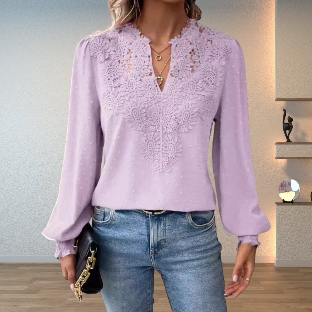 Flat lay of the Colette lightweight blouse in multiple available colors on a neutral background