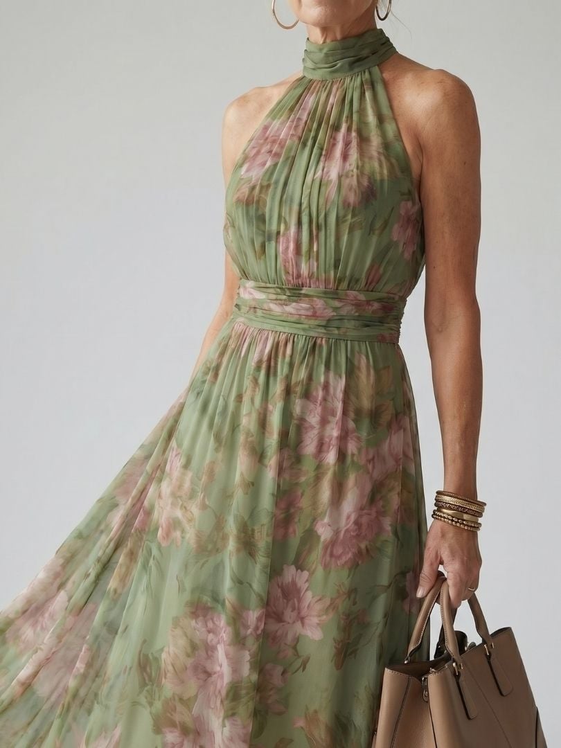 Front view of the Colette green floral halter midi dress showing romantic botanical print