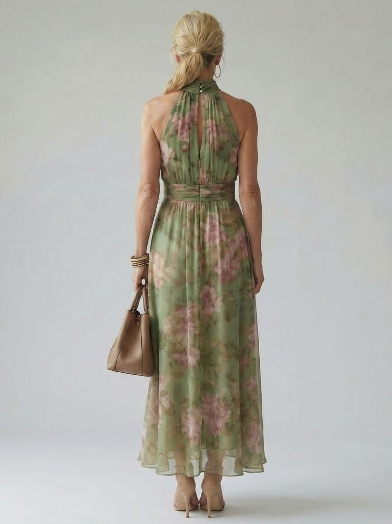 Close-up of the gathered halter neckline detail on the Colette green floral midi dress