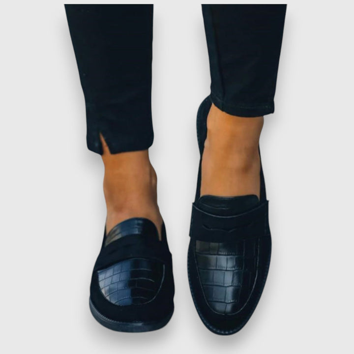 Pair of classic women's loafers styled for an everyday casual and office-ready look