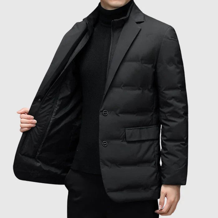Model wearing padded winter blazer styled with tailored trousers, showcasing a polished work outfit