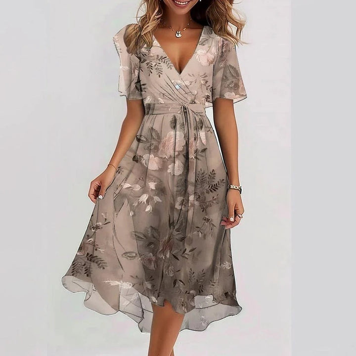 Full-length view of the Connie summer dress highlighting its flattering timeless silhouette and flowing design