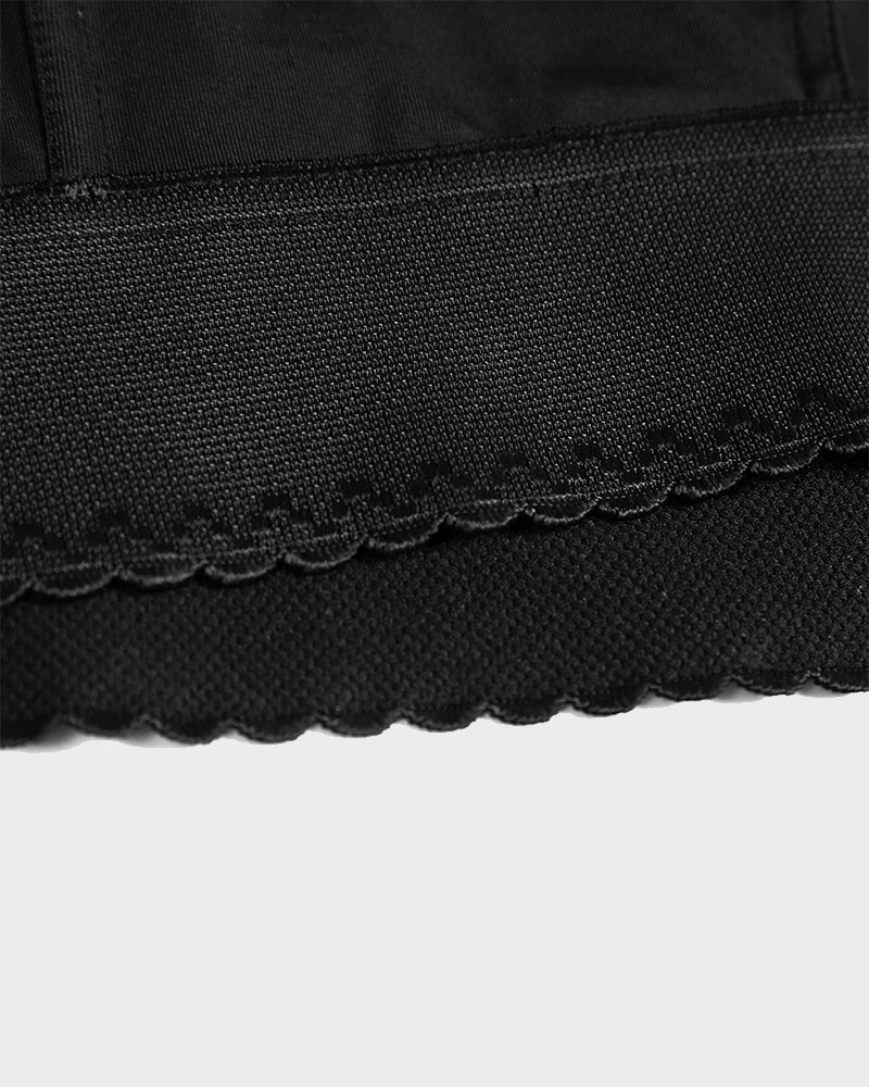 ContourFit longline push-up bra in black on model showing smooth silhouette under fitted clothing